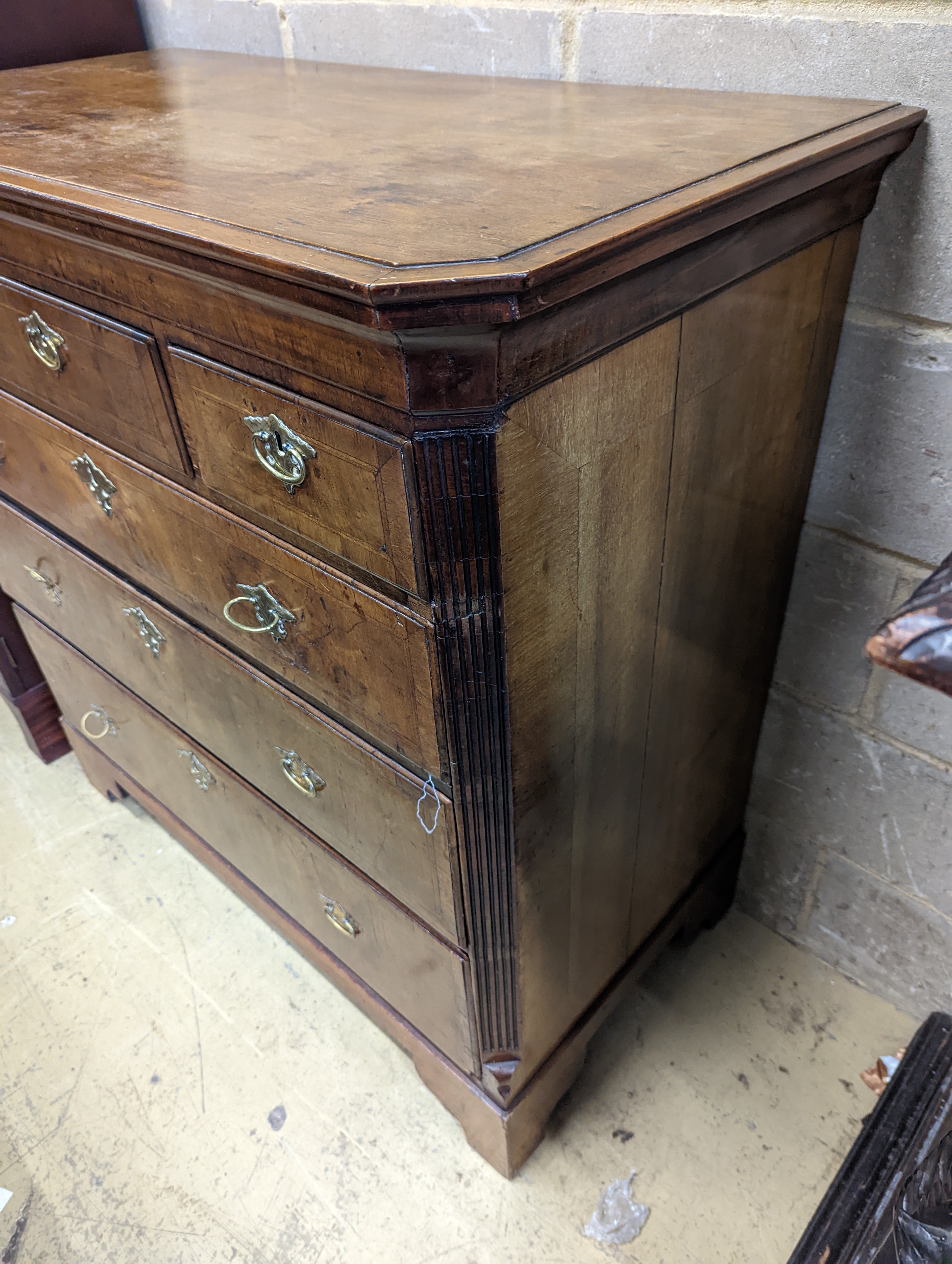 An 18th century and later walnut chest, (formerly a tallboy section) width 107cm, depth 54cm, height 107cm